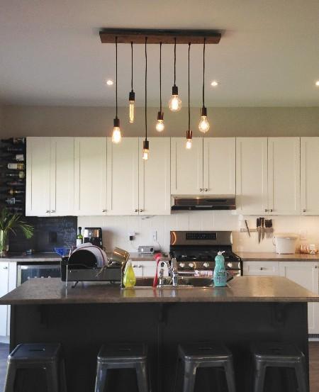 7 Pendant Wood Chandelier over a Kitchen Island  light fixture