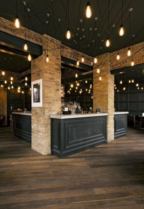 Swag Chandeliers in Industrial Brick Restaurant  light fixture